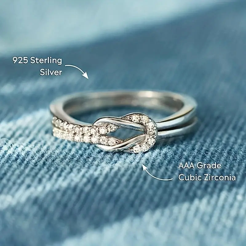 Elegant Twist Sterling Silver Infinity Ring